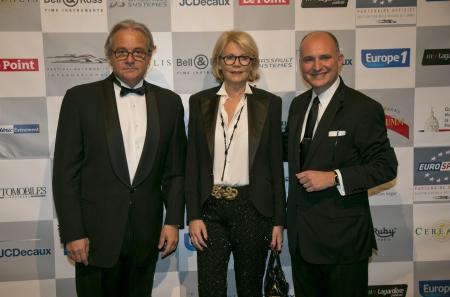 Rémy Depoix, Président et organisateur du Festival Automobile, et son épouse avec Carlos-A. Rosillo.